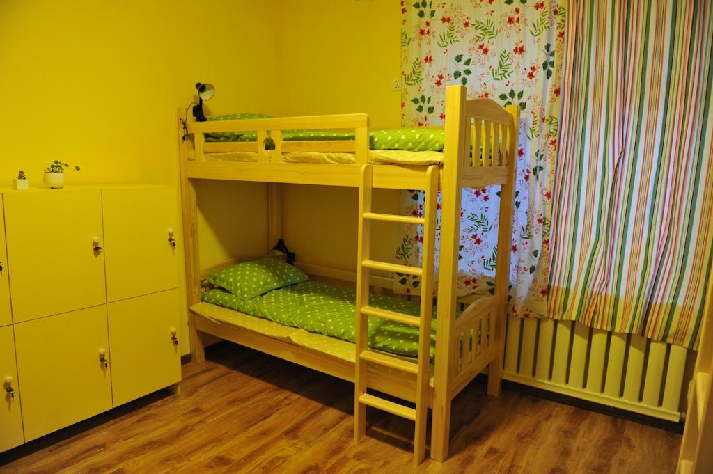 Dalian Buzz Light Year Youth Hostel Szoba fotó